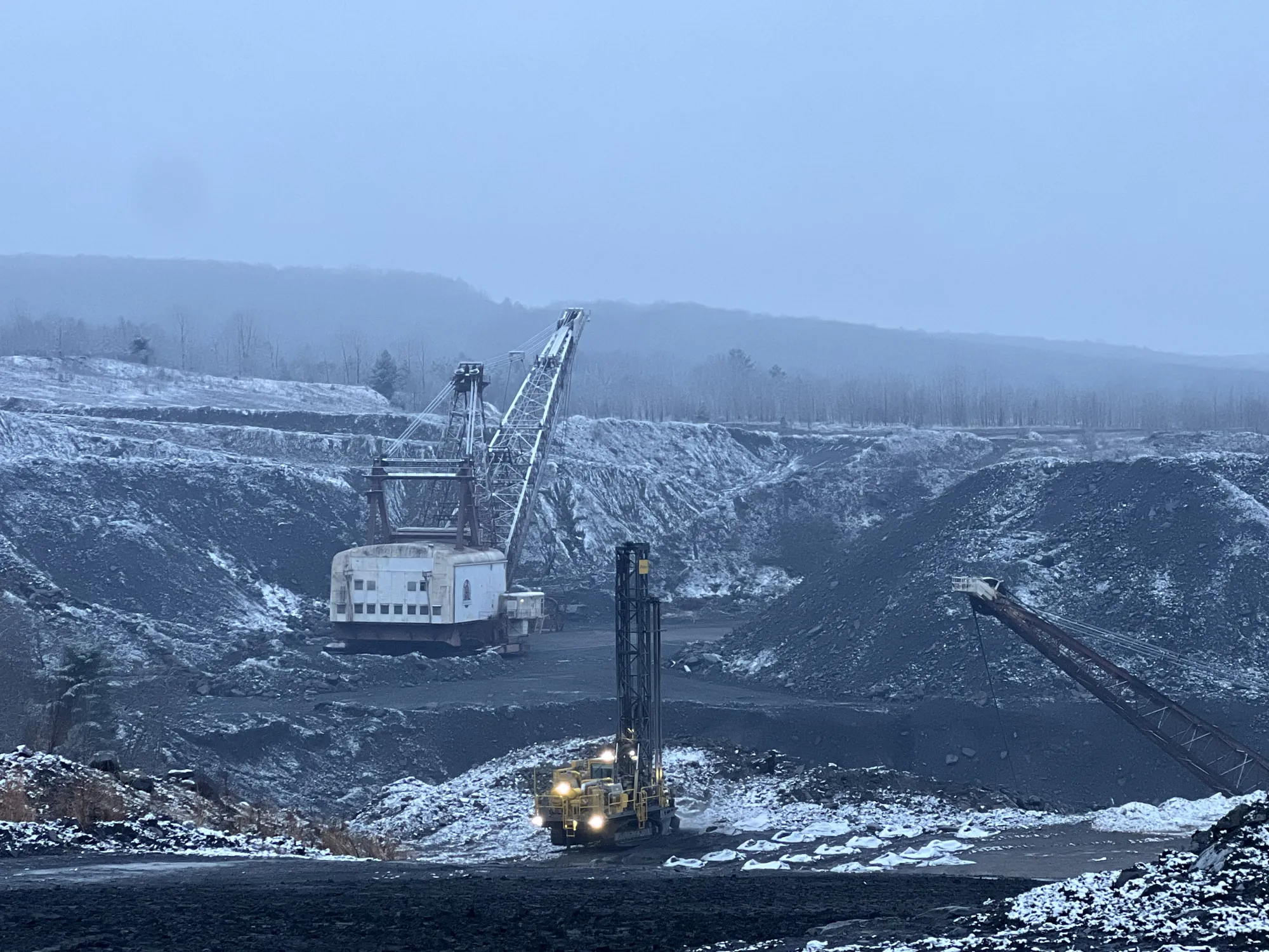 Dragline in a frosty coal pit
